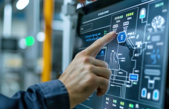 10 Ejemplos de Automatizaciones con Inteligencia Artificial que toda empresa argentina debería implementar 2 el gerente de la instalacion supervisa los controles inteligentes del edificio en la pantalla tactil optimizando la climatizacion y la iluminacion